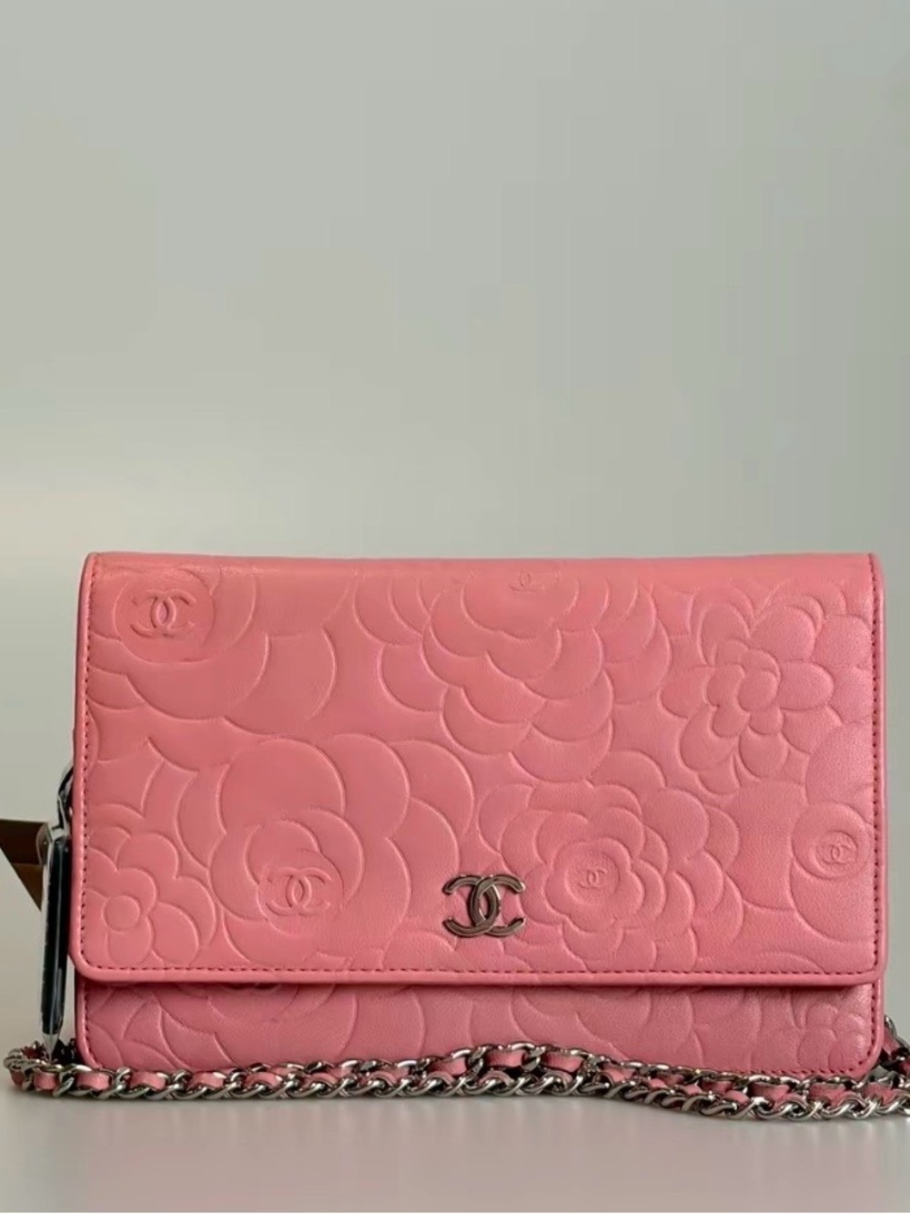 CHANEL Pink Camellia-Embossed Quilted Leather Crossbody with Silver Chain